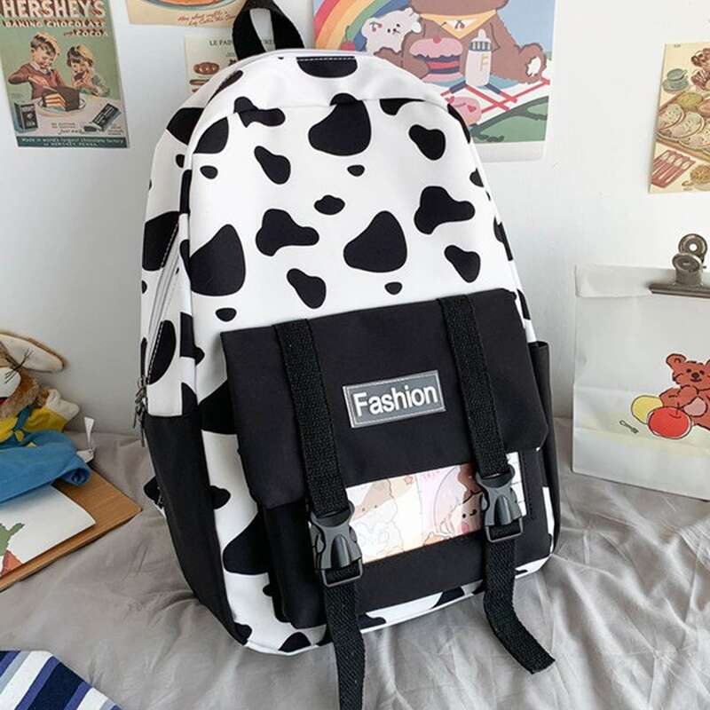 

Release Button Detail Pocket Front Cow Print Backpack, Black and white