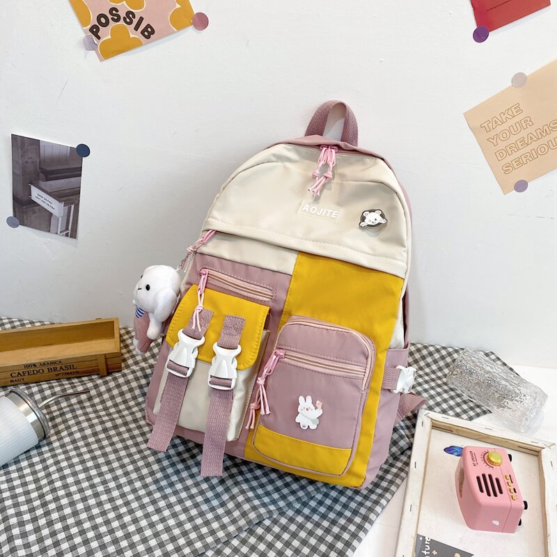 

Pocket Front Double Buckle Backpack With Cartoon Badge, Pink