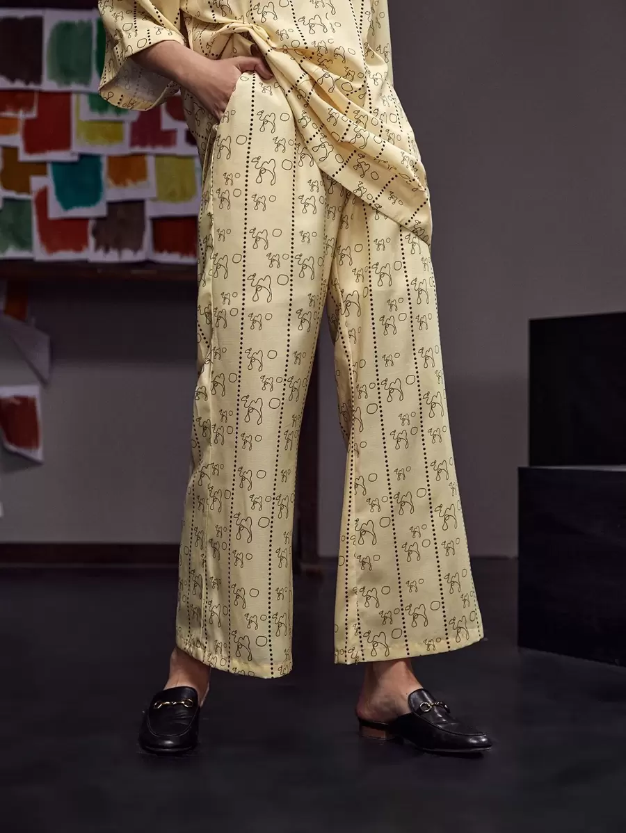 Dulcè Allover Print Flare Leg Trousers - Apricot - View 1