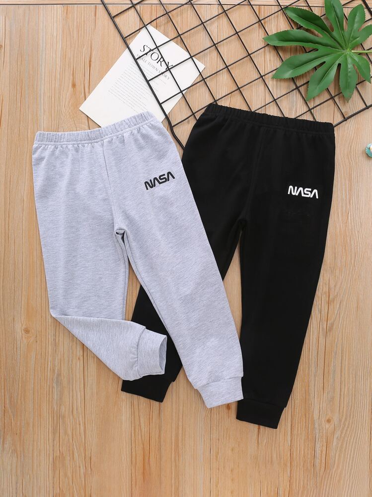 SHEIN 2 paquetes de pantalones deportivos con gráfico de letras para niño pequeño - Multicolor - Añade 1