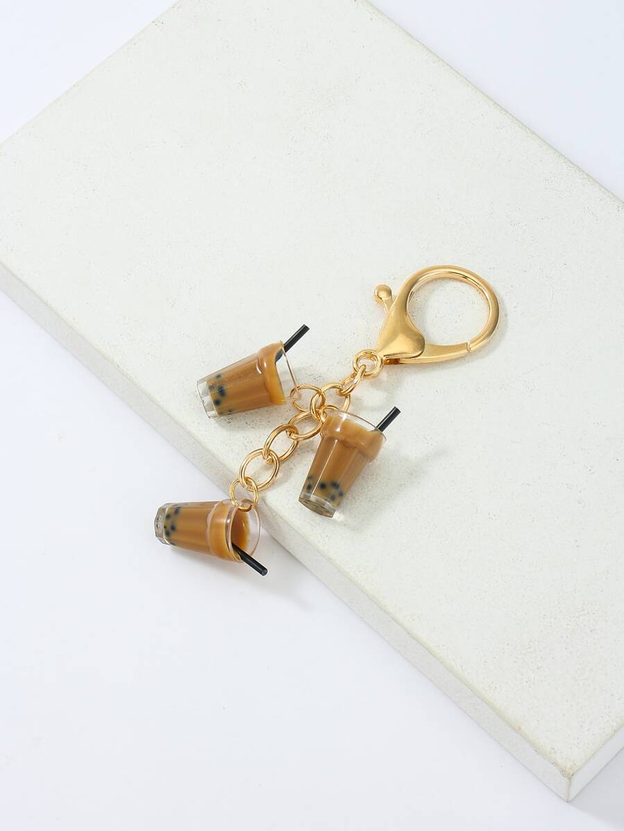 Colgante para bolsa con diseño de té con leche, lindo llavero de té con burbujas de dibujos animados, accesorios para bolsa, regalo de Acción de Gracias, regalo de Navidad, accesorios de Navidad, decoración navideña para adolescentes, mujeres, estudiantes universitarias, novatos y trabajadores de cuello blanco - Marrón - Ver 1