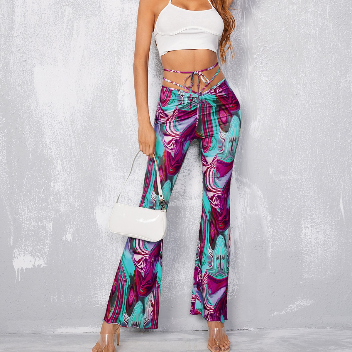 Брюки-клеш с узлом и мраморным принтом