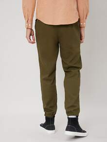 Manfinity Hombres Pantalones zanahoria unicolor con bolsillos oblicuos