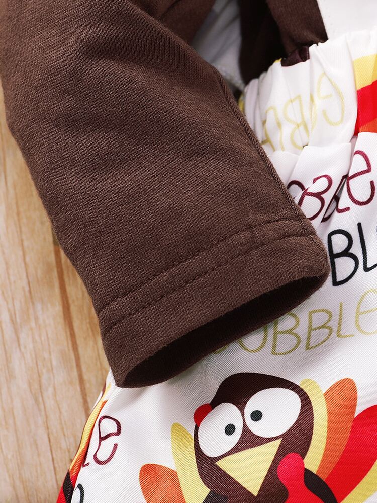 Baby Cartoon Graphic Ruffle Trim Bodysuit & Suspender Skirt & Headband