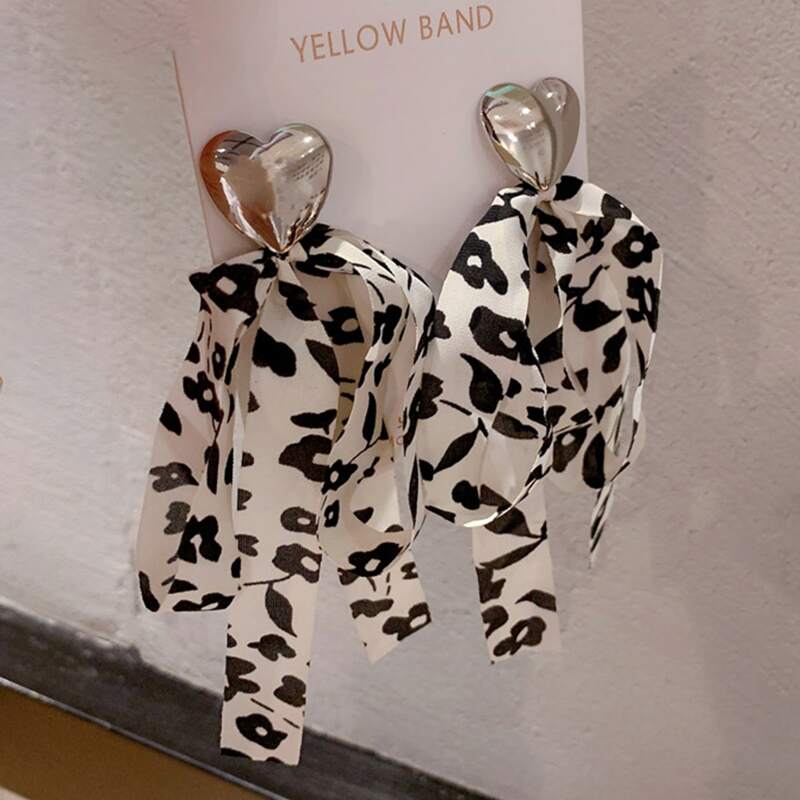 

Leopard Print Bow Earrings, Black and white