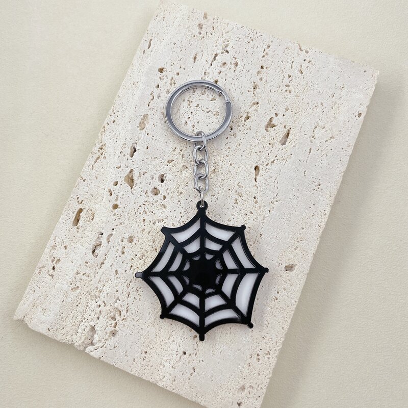 

Spider Web Pendant Keychain, Black and white