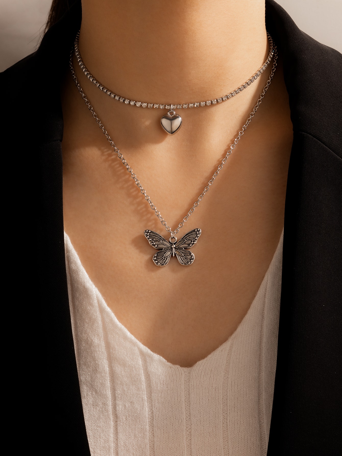 Our Butterfly Pendant Layered Chain Necklace is such a vibe
