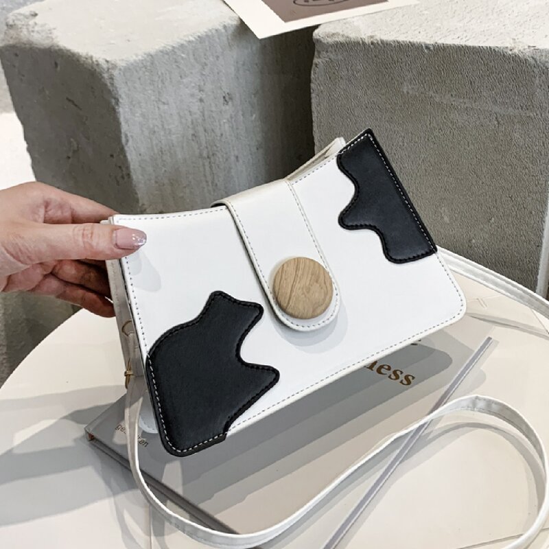 

Cow Print Crossbody Bag, Black and white