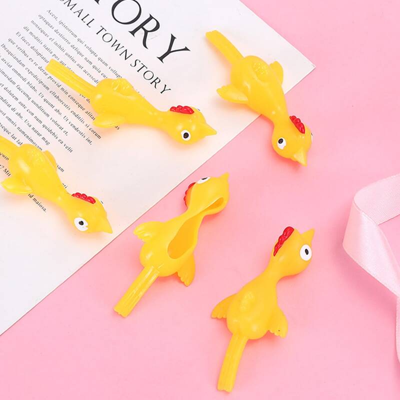 

1pc Chick Shaped Finger Slingshot Toy, Yellow