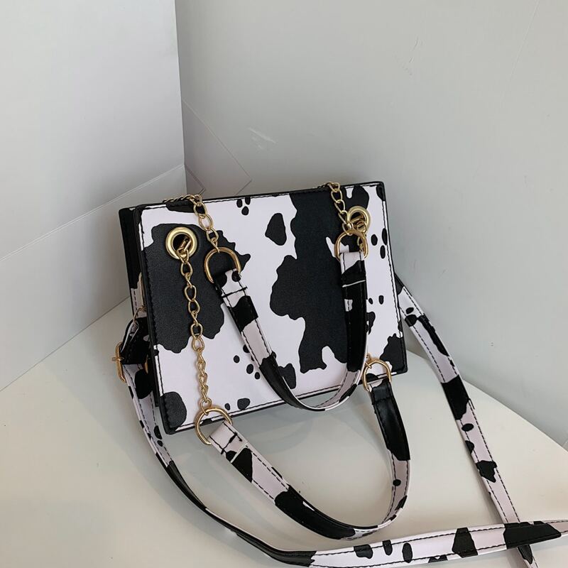 

Cow Print Shoulder Bag, Black and white