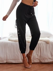 Quần thể thao nữ Dây kéo Thắt nút Ren lên Thùa khuyết màu trơn - màu đen - Xem 1