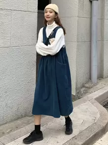 素色前口袋娃娃裙