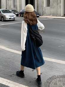 素色前口袋娃娃裙