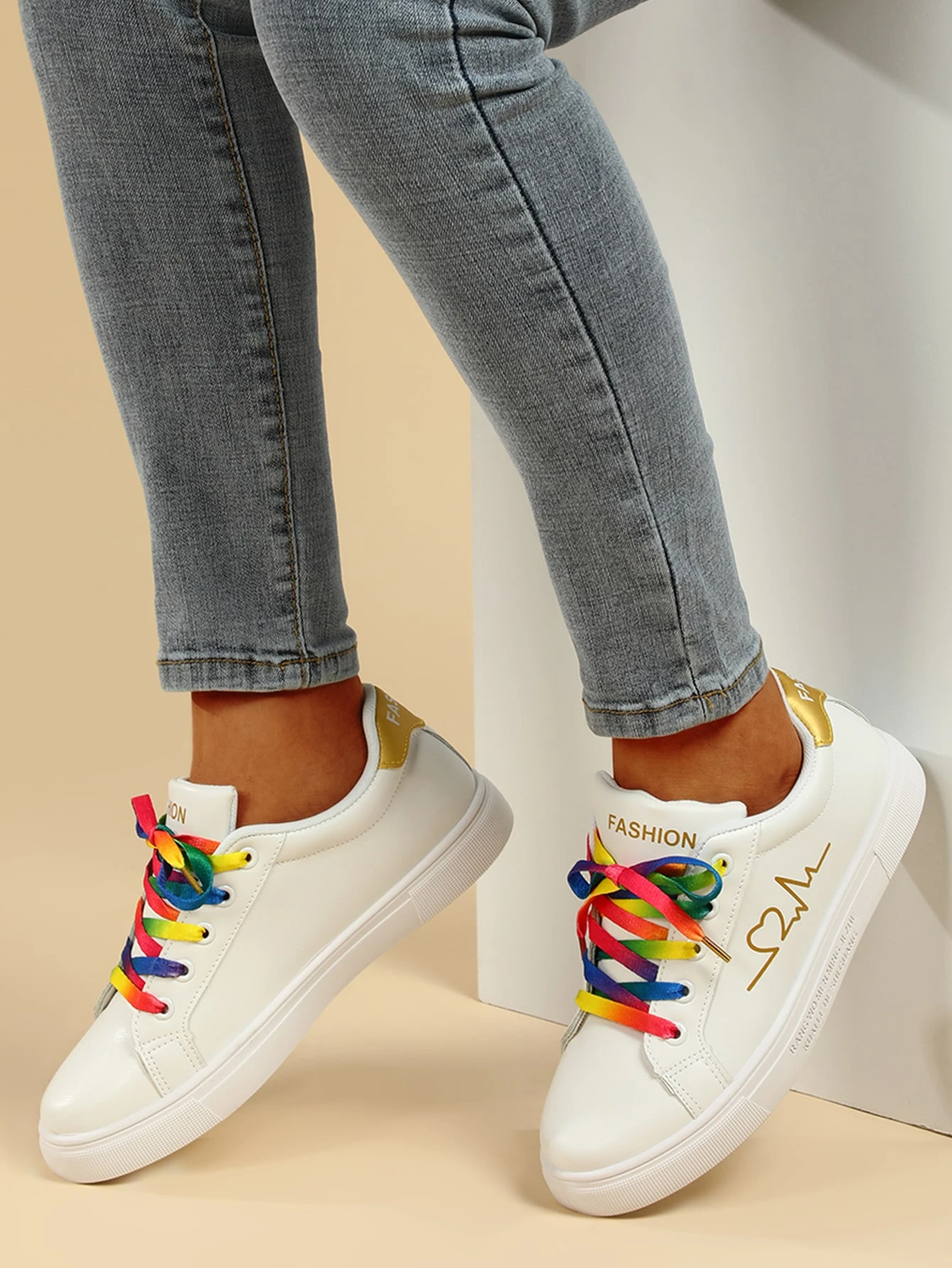 white shoes with colourful lace