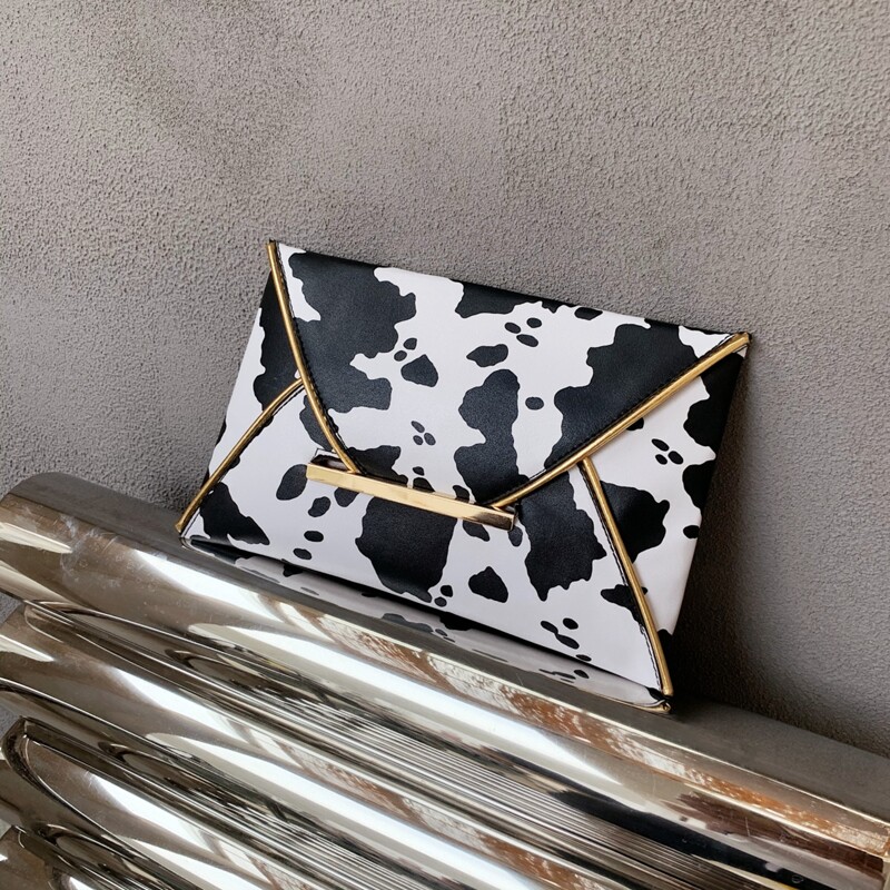 

Cow Print Clutch Bag, Black and white
