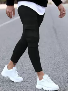 Manfinity Homme 男士翻盖口袋侧抽绳腰运动裤纯黑色外出休闲裤