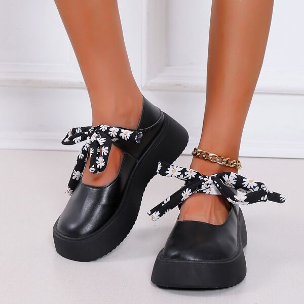 

Daisy Floral Graphic Tie Front Flatform Mary Janes, Black