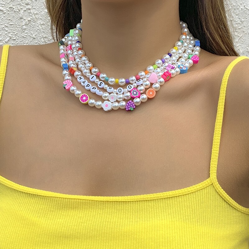 

4pcs Letter Graphic Faux Pearl Beaded Necklace, Multicolor