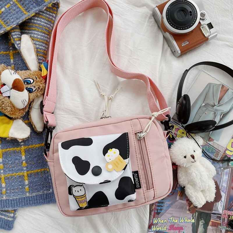 

Cow Print Crossbody Bag, Pink