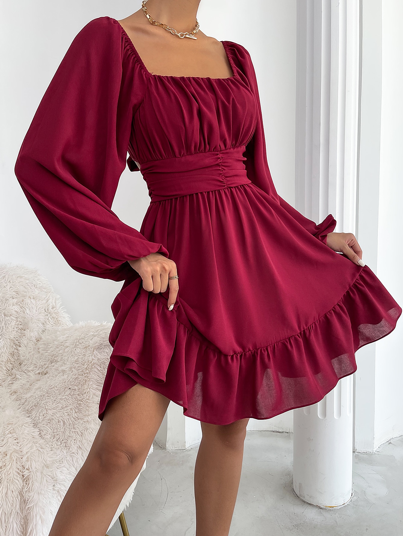 Knot back ruffle dress