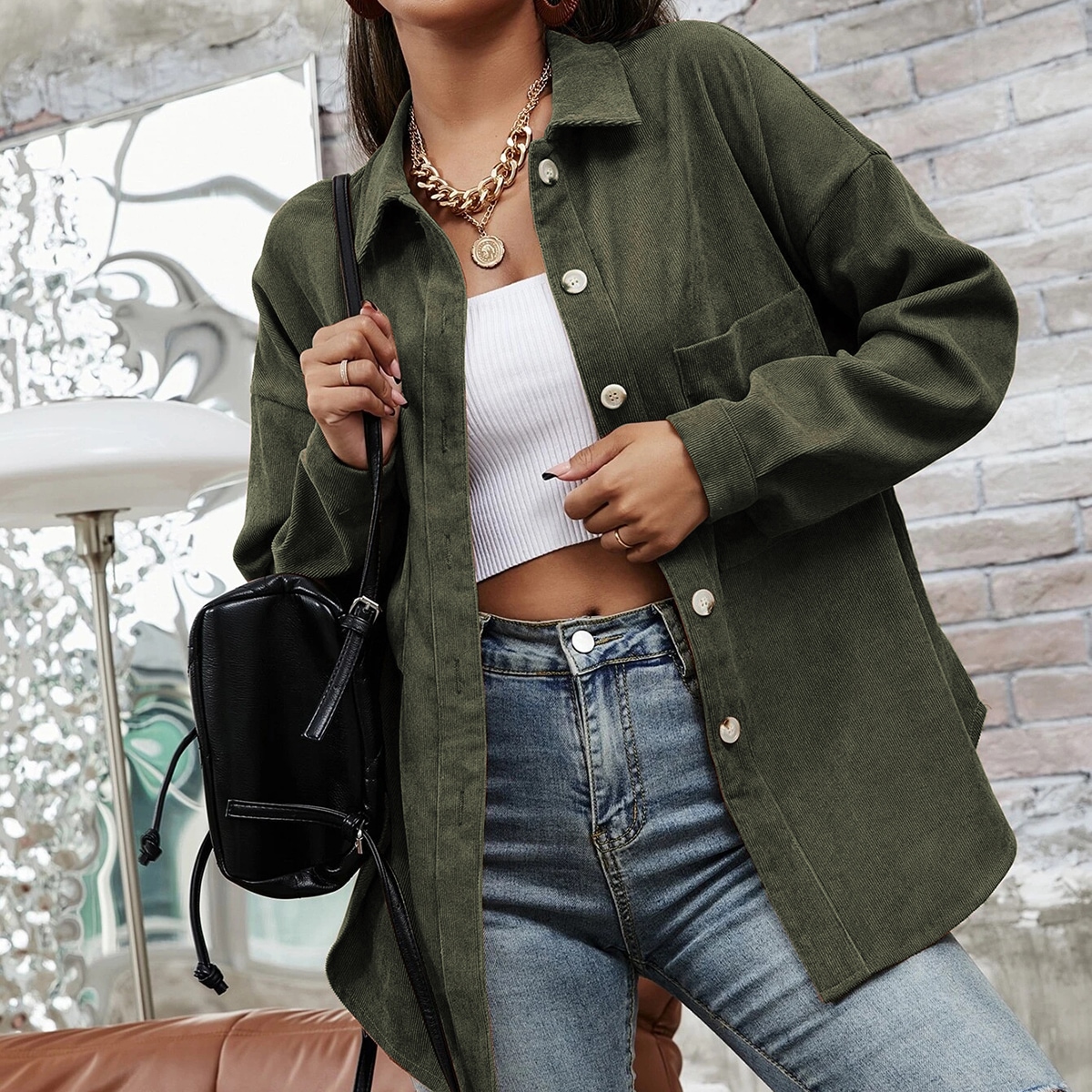 Длинная блузка с карманом