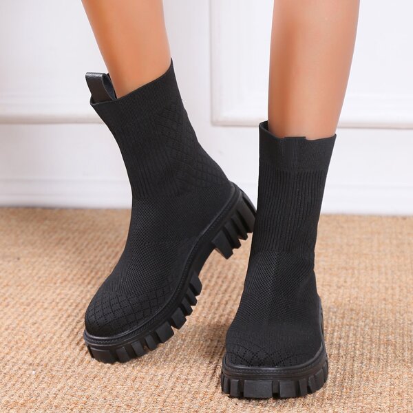 

Minimalist Slip-On Sock Boots, Black