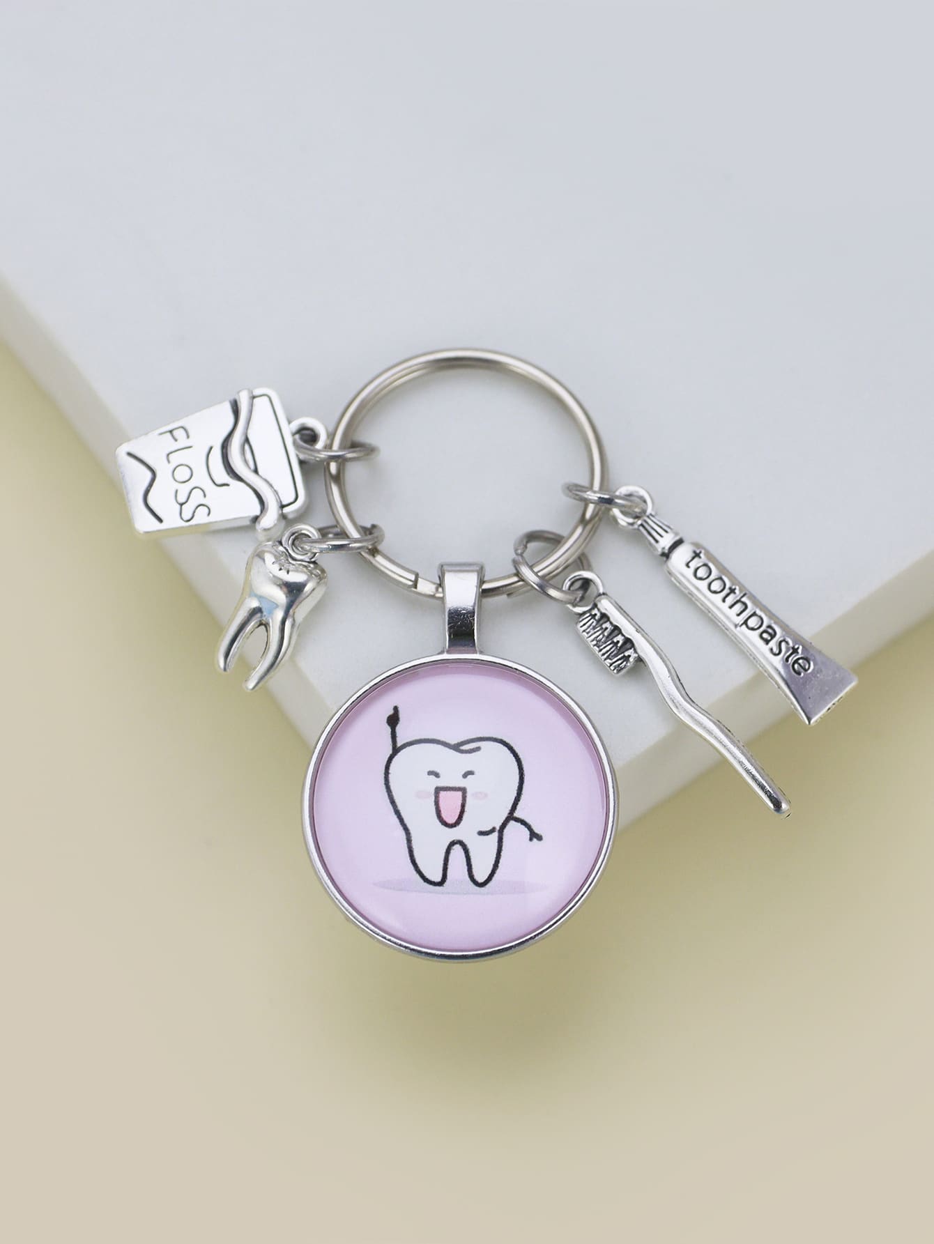 Móc khóa Charm răng - Nhiều màu - Xem 1