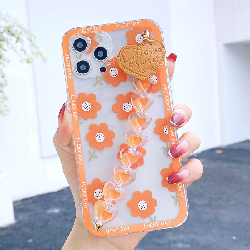 

Flower Pattern Phone Case With Heart Beaded Hand Strap, Orange