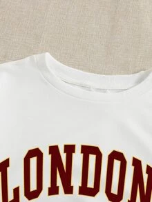 Áo nỉ Đồ họa Chữ cái - trắng - Xem 4