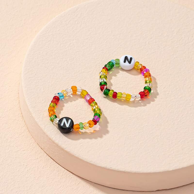 

2pcs Letter Graphic Beaded Ring, Multicolor