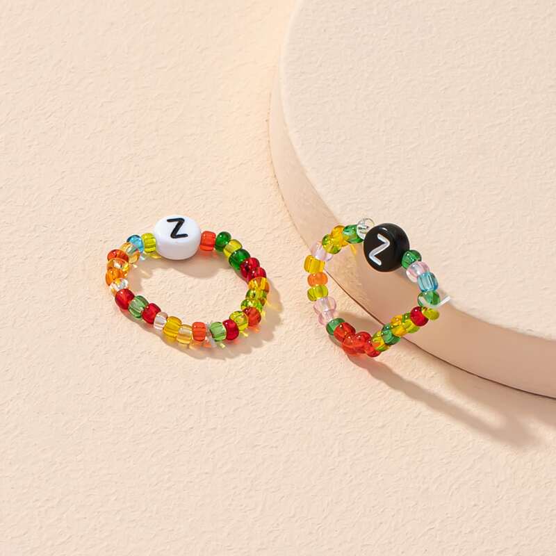 

2pcs Letter Graphic Beaded Ring, Multicolor
