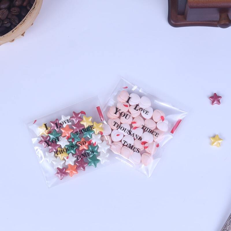 

100pcs Slogan Graphic Packaging Bag, Clear