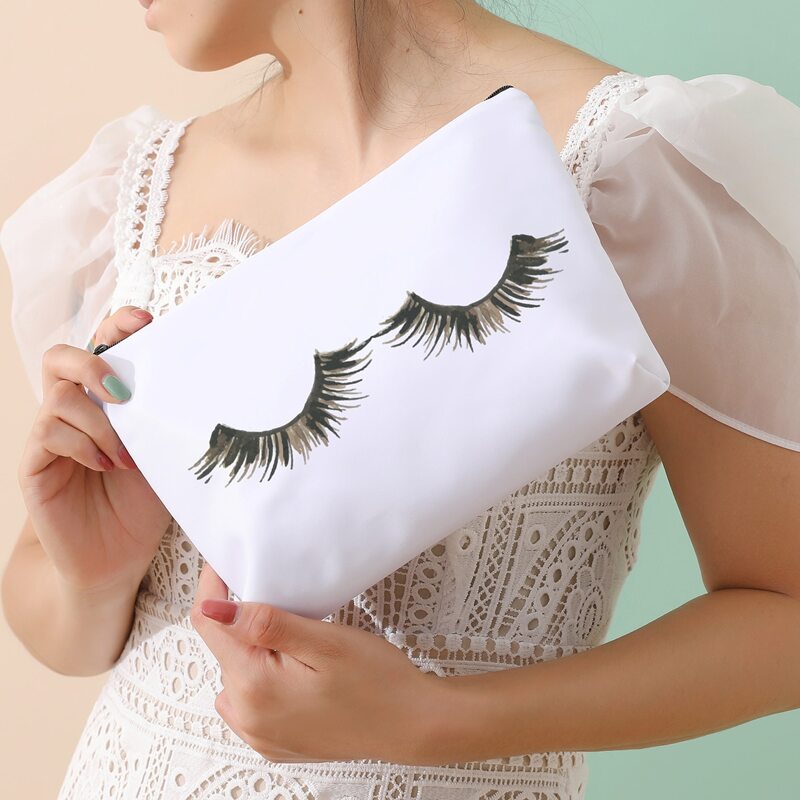

Eyelash Pattern Zipper Makeup Bag, Black and white