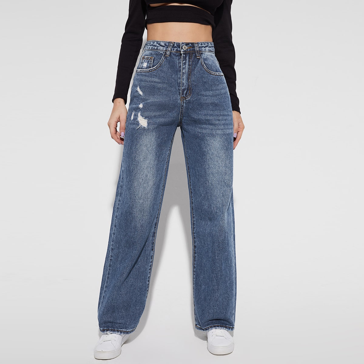 Рваные прямые джинсы с высокой талией