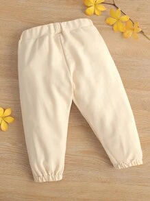 嬰兒素色斜口袋衛褲