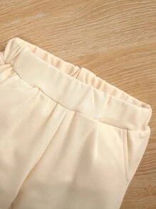 嬰兒素色斜口袋衛褲