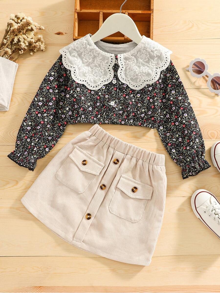 年輕女孩花卉圖案立領泡泡袖上衣和裙子