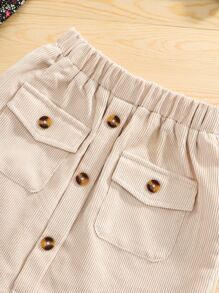 年輕女孩花卉圖案立領泡泡袖上衣和裙子