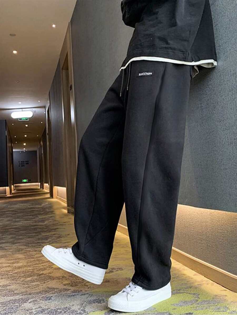 Manfinity Pantalón de chándal suelto para hombre con parches de letras y cintura con cordón - Negro - Ver 1