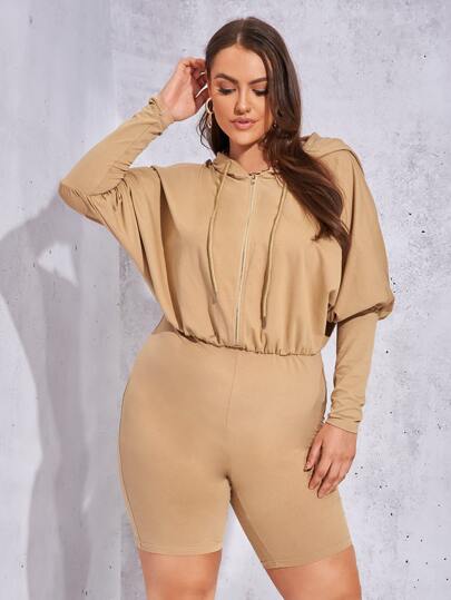 Tuta manica gigot zip con coulisse con cappuccio