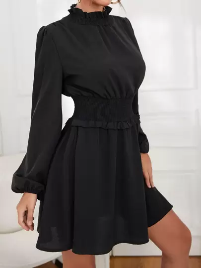 Gathered dress with puff sleeves and bow