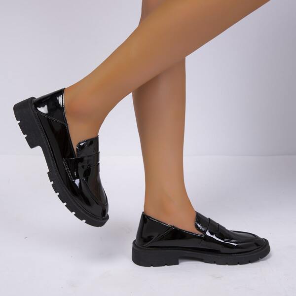 

Minimalist Textured Penny Loafers, Black