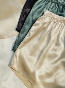 Conjunto de pijama de 3 piezas con top tipo camiseta y pantalones cortos lisos