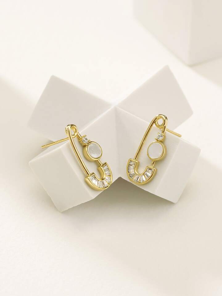 Share 141+ gold safety pin earrings uk super hot seven.edu.vn
