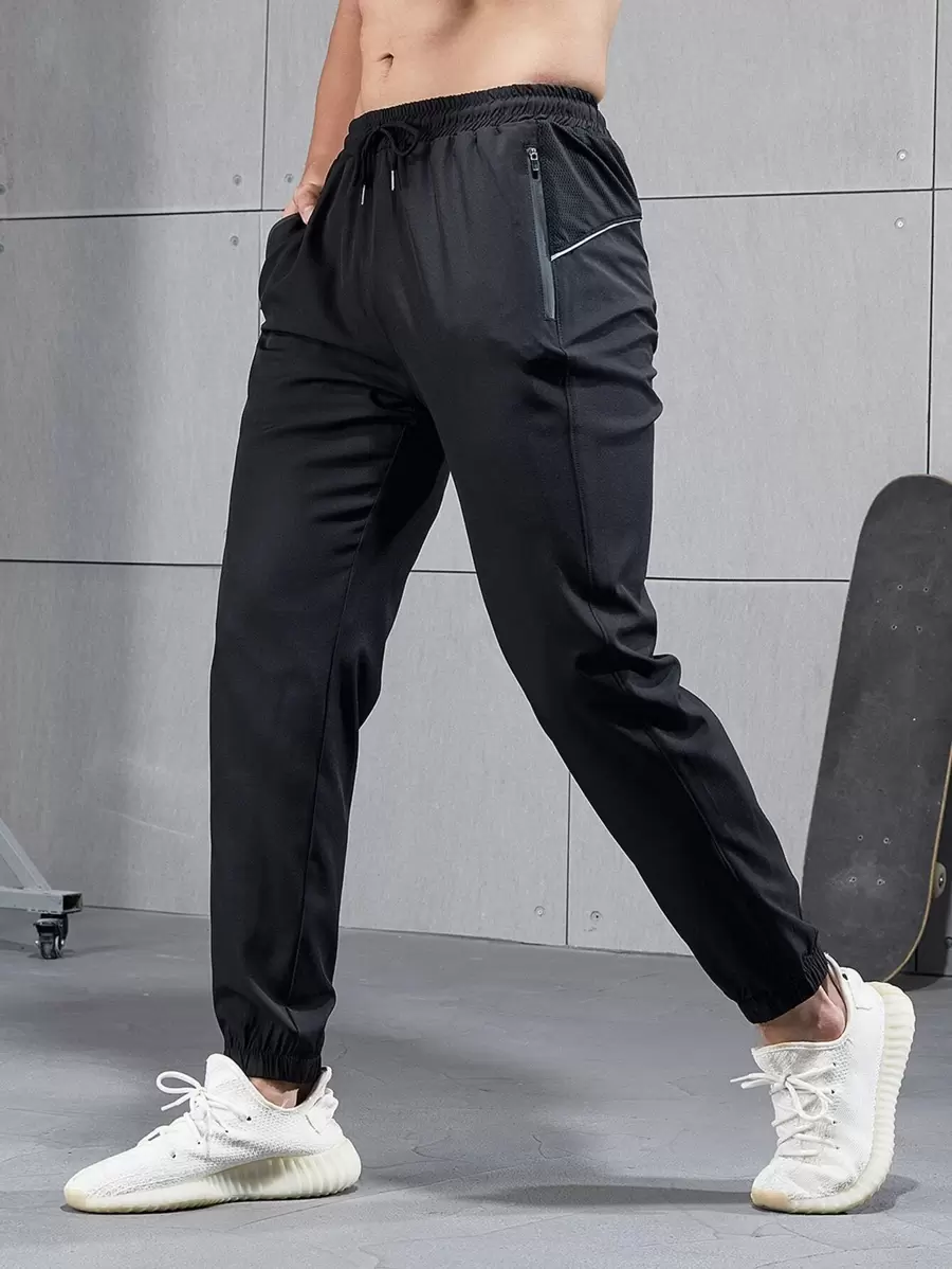 Manfinity Fitness Boyfriend Style Men Solid Zip Pocket Sport Pants Sweat-Wicking Lightweight Comfortable Running Muscle Minimalist Design Slim Fit For Workout Gymwear