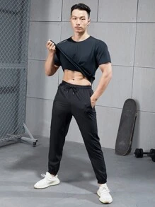 Manfinity Fitness Boyfriend Style Men Solid Zip Pocket Sport Pants Sweat-Wicking Lightweight Comfortable Running Muscle Minimalist Design Slim Fit For Workout Gymwear