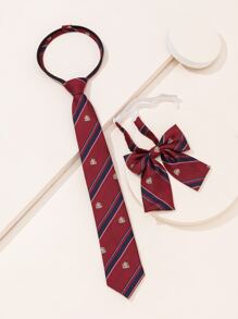 2 件套女士校服风格服装，配有百搭皇冠领带配饰