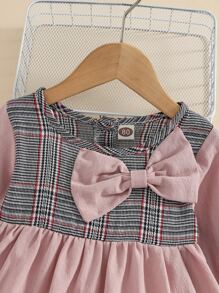 小女童格紋前蝴蝶結荷葉袖上衣和緊身打底褲