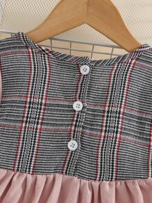小女童格紋前蝴蝶結荷葉袖上衣和緊身打底褲
