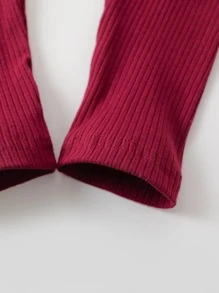 小女童條紋針織花邊下擺上衣和緊身打底褲